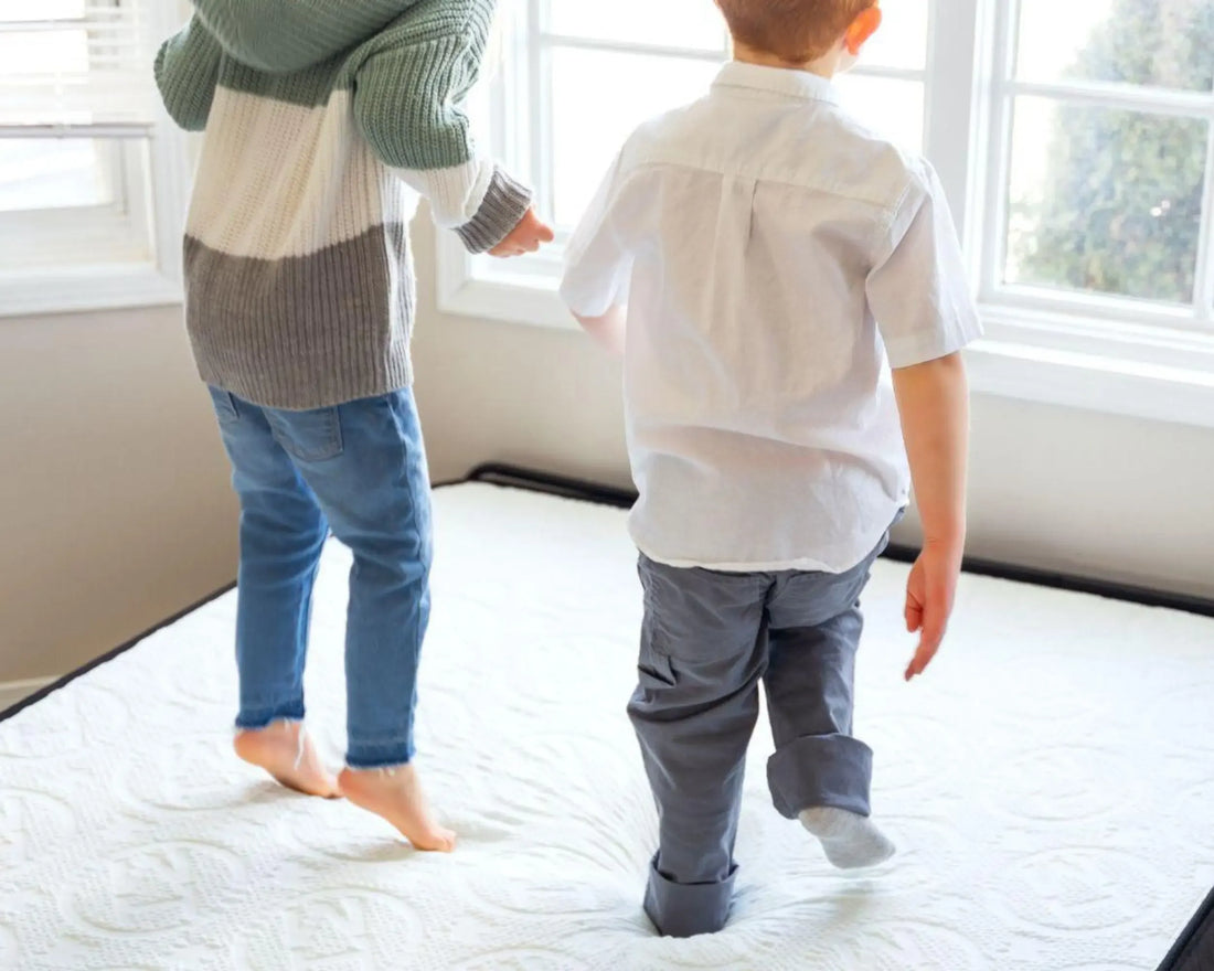 Kids playing on Hiber kids mattress – safe, comfy, and durable sleep solution.