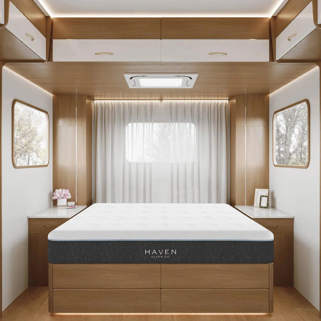 Haven LUX Rejuvenate RV Mattress showcased in a beautifully designed RV with a white and oak interior.