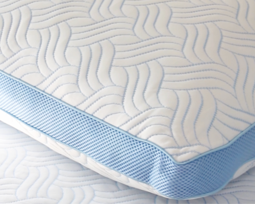 Haven's Cool Ice Adjustable Fill Pillow with a cooling wave pattern and blue mesh trim, designed for optimal temperature regulation and customized support.