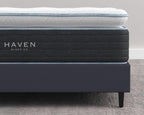 Close-up side view of the 14-inch Haven LUX Pillowtop Hybrid Mattress with visible pillowtop layer and branded side panel.