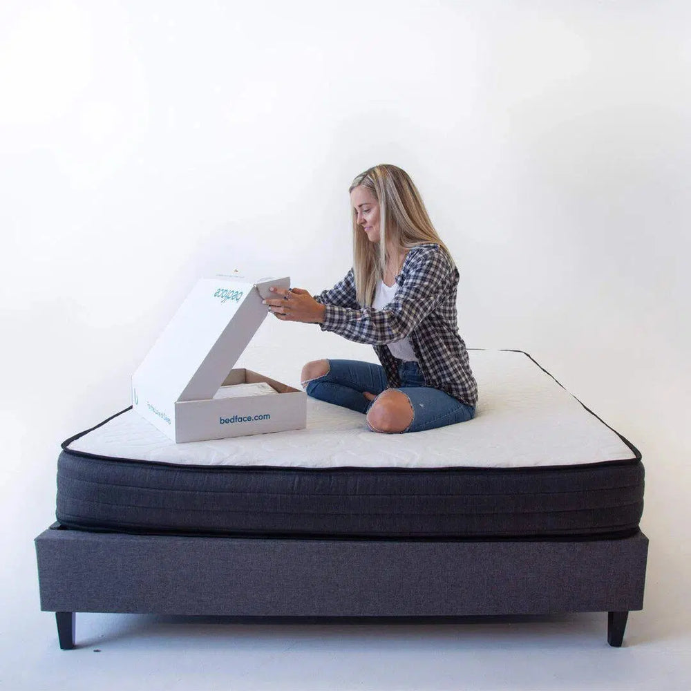 Teenager relaxing on the HIBER mattress, Canadian-made with plant-based, eco-friendly materials that provide natural comfort and support for growing bodies.