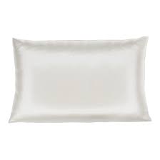 White satin pillowcase from the Dream Satin Sleep Set, offering a smooth and glossy finish, cruelty-free and sustainable, designed to reduce hair breakage and provide a luxurious, rejuvenating sleep experience.