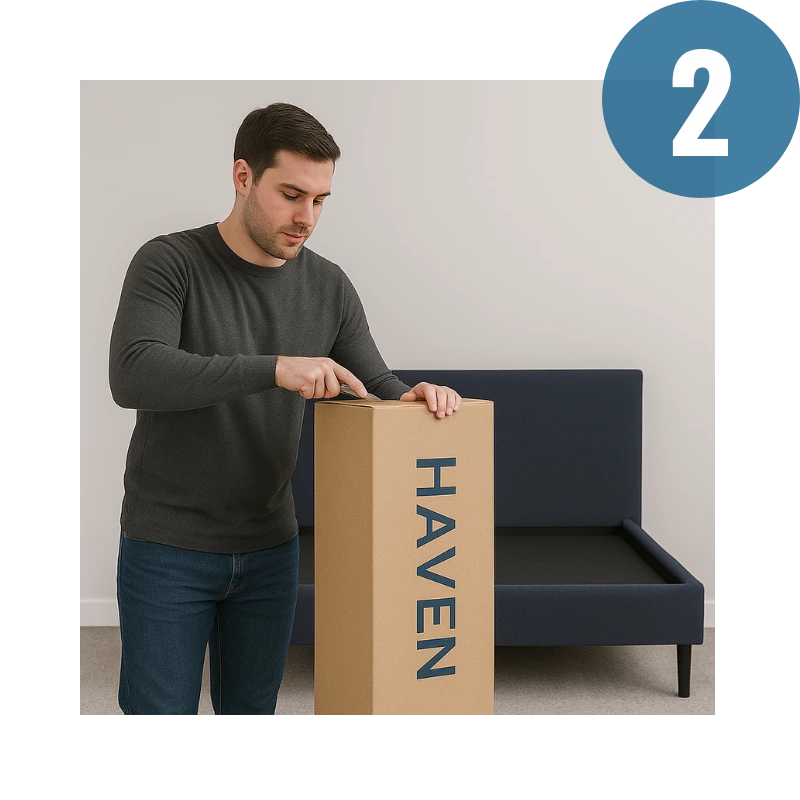 Man opening a cardboard box labeled 'Haven' next to a blue Haven bed frame.