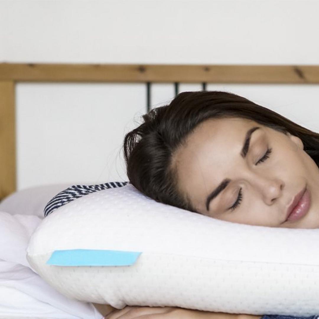 woman sleeping on a Bedface Vitagel 4 in 1 pillow with her hands tucked under the pillow